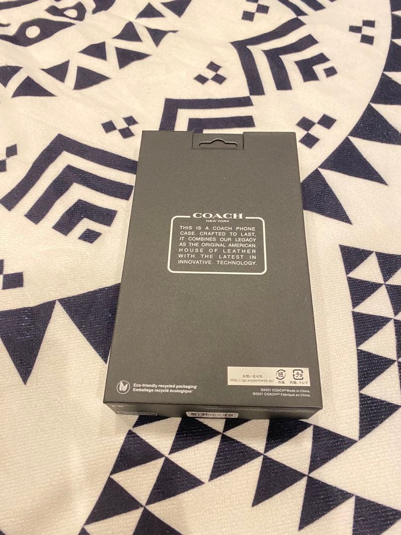 新品COACH iPhone13手帳型カバーシグネチャーコーチブラック/値下げ中