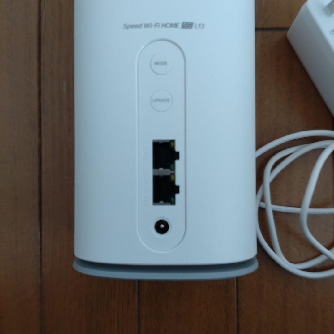 Speed Wi-Fi  L3 本体と電源アダプタ