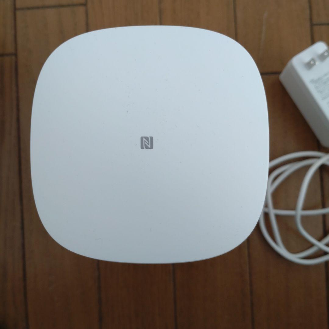 Speed Wi-Fi  L3 本体と電源アダプタ