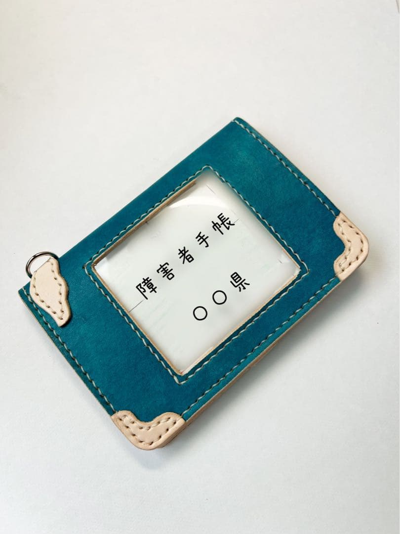 障害者手帳ケース　カラータイプ　革飾り　翼の金具付き